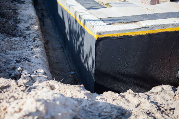 Professional Waterproofing technician working in Millwood, VA
